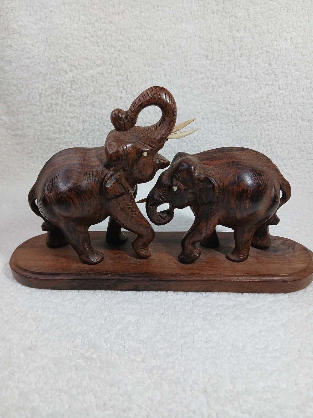 Hand-Carved Brown Wooden Fighting Elephants Figurine Pair